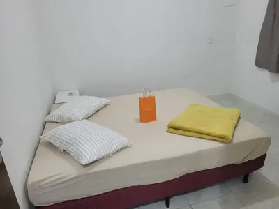 Uma cama ou camas num quarto em Recanto dos Ganchos