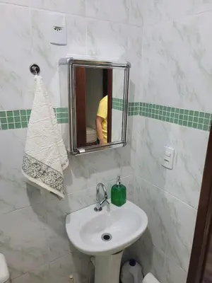 Uma casa de banho em Recanto dos Ganchos