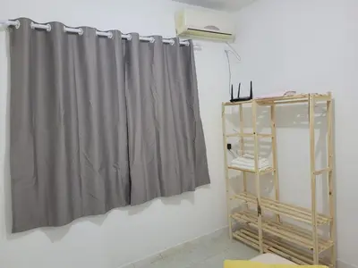 Uma cama ou camas num quarto em Recanto dos Ganchos