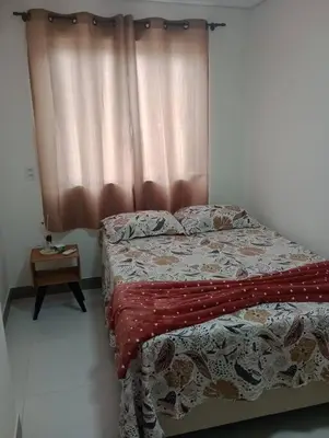 Uma cama ou camas num quarto em Linda Casa 2 no Sossego da Praia