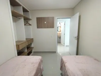 Uma cama ou camas num quarto em Refúgio Praiano em Bombinhas - Aluguel Temporada