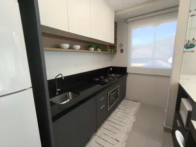 A cozinha ou kitchenette de Refúgio Praiano em Bombinhas - Aluguel Temporada
