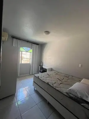 Uma cama ou camas num quarto em Casa mirante com piscina em Governador Celso Ramos
