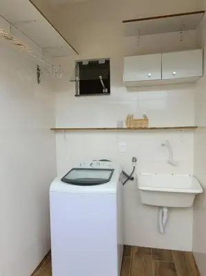 A cozinha ou kitchenette de Sobrado com garagem e churrasqueira