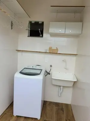 A cozinha ou kitchenette de Sobrado com garagem e churrasqueira