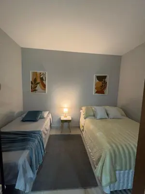 Uma cama ou camas num quarto em Loft veraneio