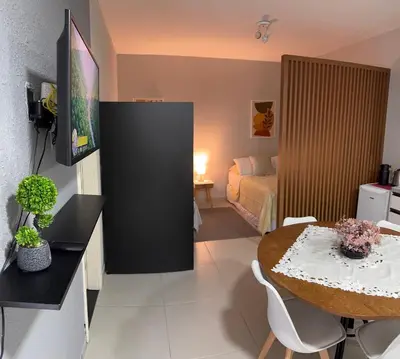 Uma televisão e/ou sistema de entretenimento em Loft veraneio