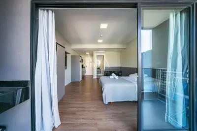 Uma cama ou camas num quarto em 509- Suite no Villa Francione Bombas