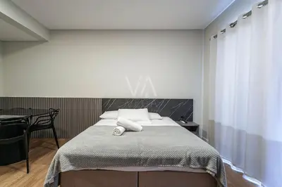 Uma cama ou camas num quarto em 509- Suite no Villa Francione Bombas
