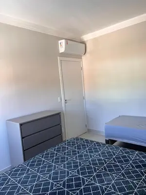 Uma cama ou camas num quarto em Apartamento De Praia em Bombinhas