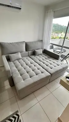 Uma área de estar em Condomínio Vista Atlântico - Apartamento Novo - Próximo à Praia - Vista Mar - Área de Lazer