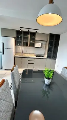 A cozinha ou kitchenette de Condomínio Vista Atlântico - Apartamento Novo - Próximo à Praia - Vista Mar - Área de Lazer