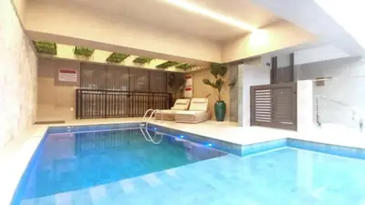 A piscina em ou perto de PR-101 Moderno Dpto 1dorm a 180m de la playa