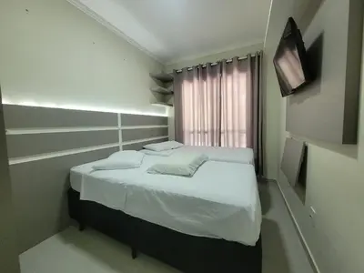 Uma cama ou camas num quarto em Apartamento aconchego.