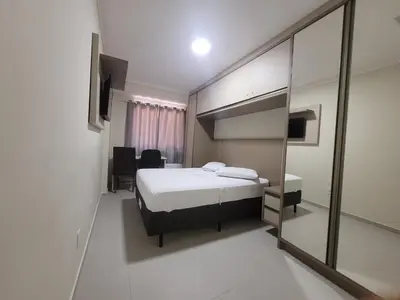 Uma cama ou camas num quarto em Apartamento aconchego.