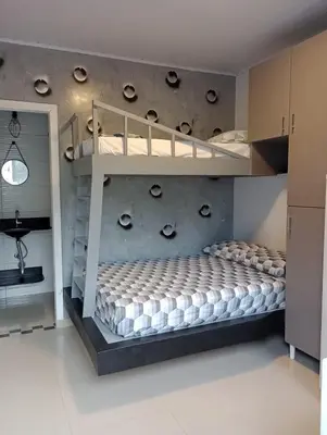 Uma cama ou camas num quarto em kitnet 3