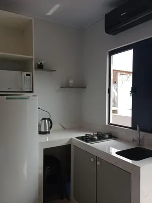 A cozinha ou kitchenette de kitnet 3