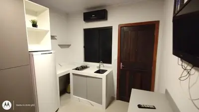 A cozinha ou kitchenette de kitnet 3