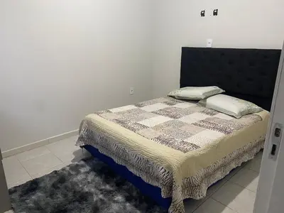 Uma cama ou camas num quarto em AP completo a 5 min da Praia, Itapema-SC