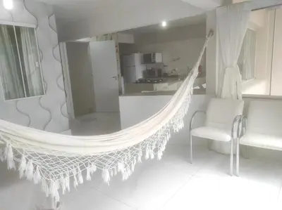 Uma área de estar em Promoção três quartos na Atlântica