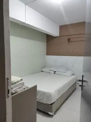 Uma cama ou camas num quarto em Promoção três quartos na Atlântica
