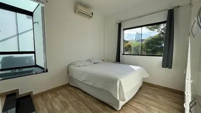 Uma cama ou camas num quarto em Rota do Sol