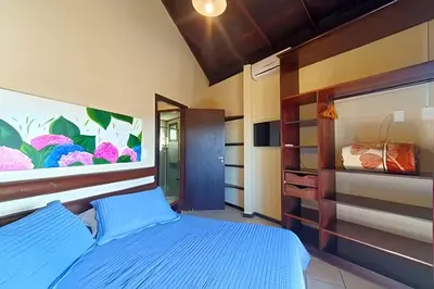 Uma cama ou camas num quarto em Villa Garoupeta