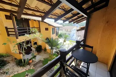 Uma varanda ou terraço em Villa Garoupeta
