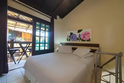 Uma cama ou camas num quarto em Villa Garoupeta