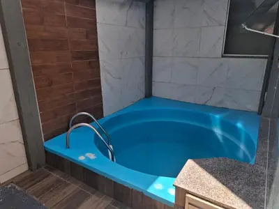 A planta de Apto Térreo Privativo com Piscina Ar condicionado e vaga de estacionamento em Itapema