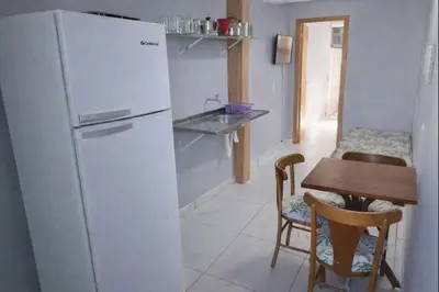 A cozinha ou kitchenette de Apto Térreo Privativo com Piscina Ar condicionado e vaga de estacionamento em Itapema