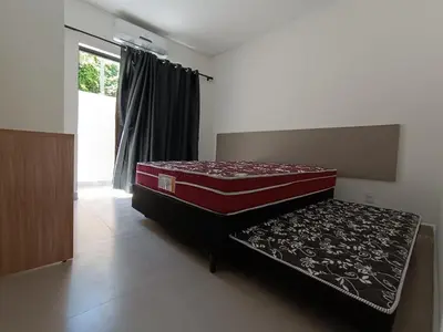 Uma cama ou camas num quarto em RESIDENCIAL FLAMINI DUO