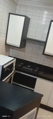 A cozinha ou kitchenette de Excelente apto com Piscina privativa em Bombas