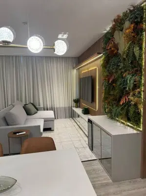 Uma área de estar em Infinity Tower Flat - 1403