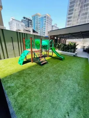 A área de jogos para crianças em Infinity Tower Flat - 1403