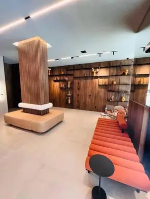 Uma área de estar em Infinity Tower Flat - 1403