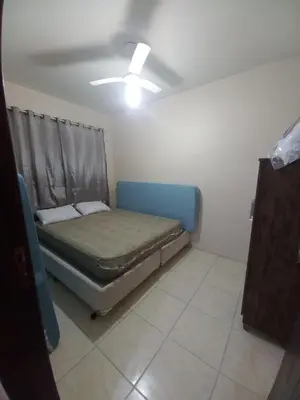 Uma cama ou camas num quarto em Casa em Bombinhas