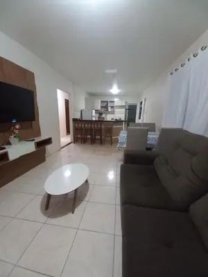 Uma área de estar em Casa em Bombinhas