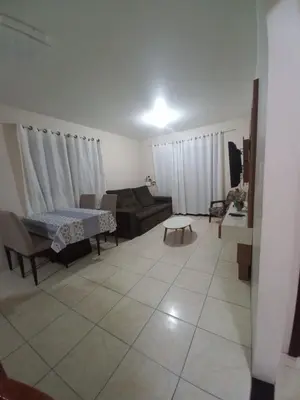 Uma área de estar em Casa em Bombinhas