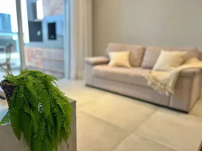 Uma área de estar em Vista mar! Apto alto padrão! ZS26H