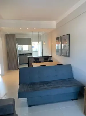 Uma área de estar em Apartamento de Praia em Bombinhas
