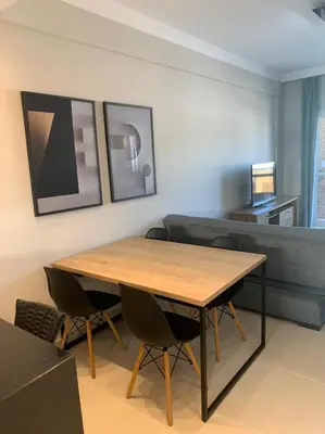 Uma área de estar em Apartamento de Praia em Bombinhas
