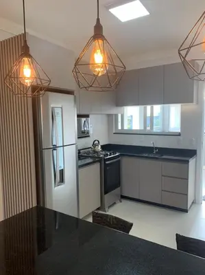 A cozinha ou kitchenette de Apartamento de Praia em Bombinhas