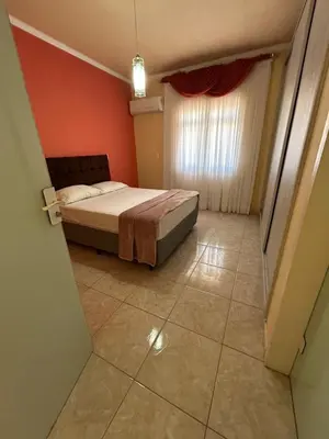Uma cama ou camas num quarto em Residência Vó Nilton