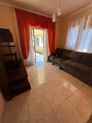 Uma área de estar em Residência Vó Nilton