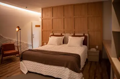 Uma cama ou camas num quarto em Morada Pedra Branca boutique Hotel