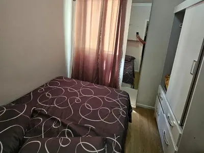 Uma cama ou camas num quarto em Apartamento Beira-mar praia centro itapema