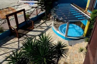 A piscina em ou perto de Residencial Vila do Sol, Apartamentos com pé na areia