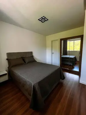 Uma cama ou camas num quarto em Apartamento em itapema com maravilhosa vista mar