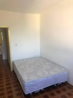 Uma cama ou camas num quarto em Condomínio Eliliane - Cobertura em Canto Grande